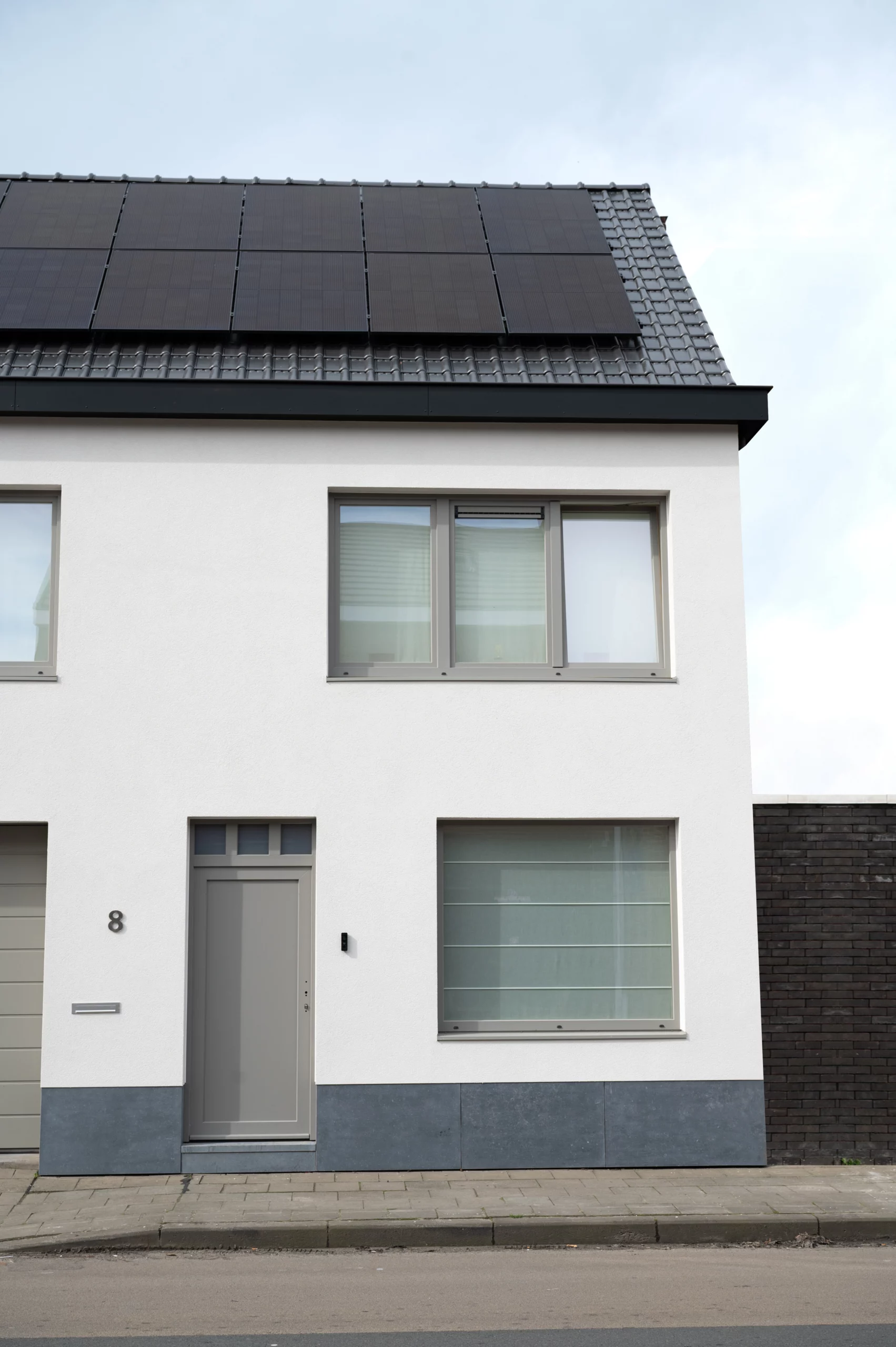 Rijwoning Heestert onderhoudslaag voorkant woning